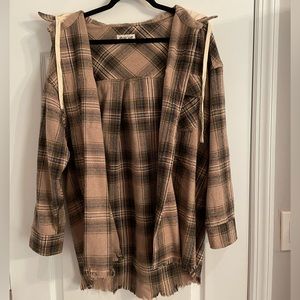 Boutique hooded flannel with frayed bottom